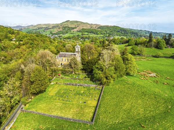 Holy Trinity Church from a drone, Bog Lane, Brathay village, Lake District, Cumbria, England, United Kingdom