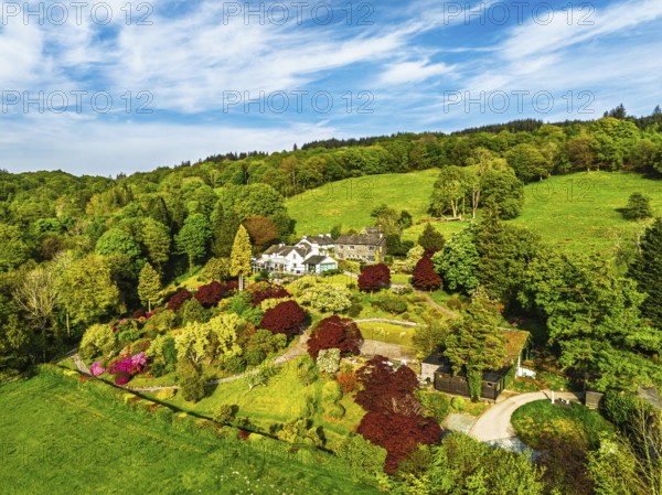 Farms over Coniston Water from drone, Lake District National Park, Cumbria, UK