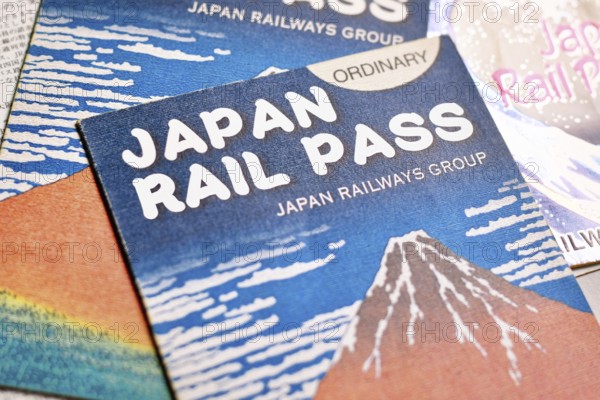 Germany - August 2nd 2025: Japanese Rail Pass for tourists. Train travel ticket for unlimited journeys in Japan