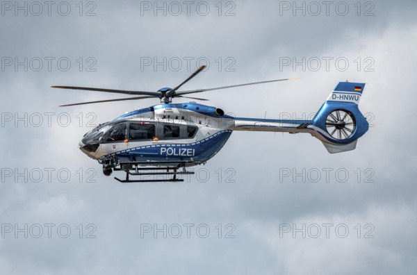 Police helicopter, Airbus Helicopters H145, of the North Rhine-Westphalia State Police, after take-off at Düsseldorf Airport, Police Air Wing