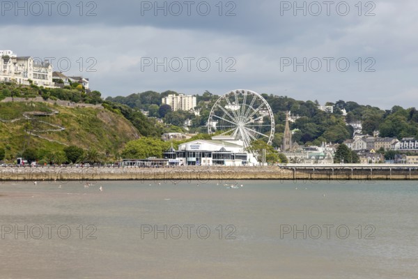 View to Princess Theatre and Ferris Wheel, Torre Abbey Sands sandy beach, Torquay, Devon, England, UK