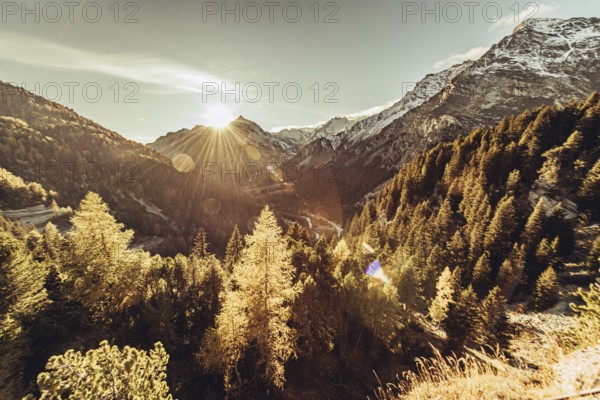 Autumn atmosphere in the Swiss Alps in the Engadine. Photographed from the village of Maloja on the Maloja Pass