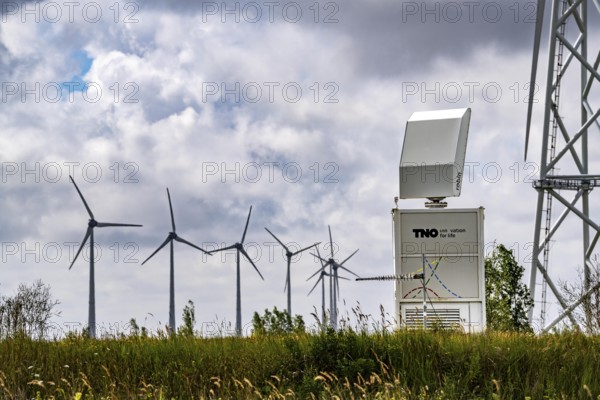 Wind farm in Eemshaven, radar system of the Dutch manufacturer Robin, bird radar, here type Robin Max Radar, detects birds and flocks of birds up to 15 km away in order to switch off wind turbines if necessary to avoid collisions and minimise damage, Netherlands