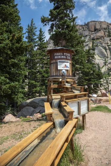Colorado Springs, Colorado - A sluice along the highway to the Pikes Peak summit offers tourists a chance to mine for gemstones