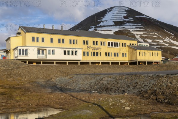 Hospital, yellow wooden house, Longyearbyen, Spitsbergen, Svalbard