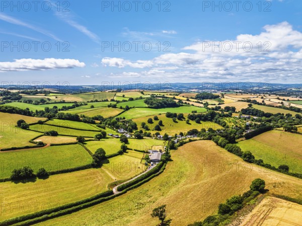 DefaultFarms and Fields over Torquay from a drone, Devon, England, United Kingdom