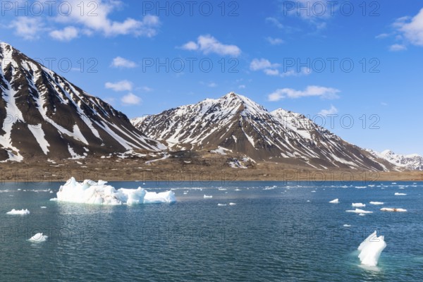 Mountain tops, snow, sea, Konowbreen, Spitsbergen, Svalbard