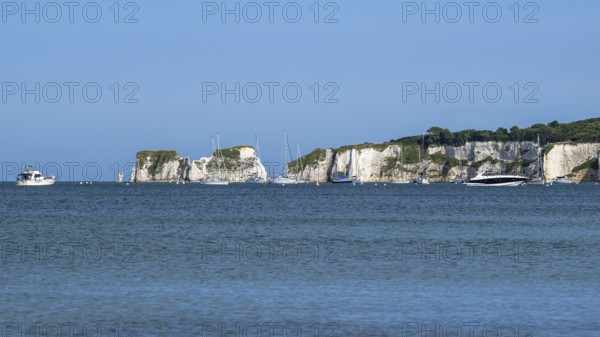 Boats on sea over Knoll Beach Studland, Poole, Dorset, England, United Kingdom