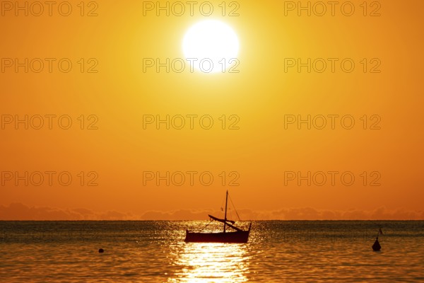 The sun rises on the Costa Rei, a stretch of coastline on the Italian Mediterranean island of Sardinia, Monte Nai, Costa Rei, Sardinia, Italy