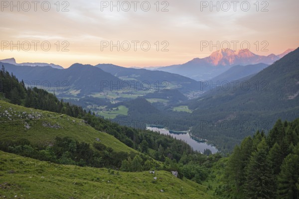 Magical sunset at the Halsalm above the Hintersee with views of the Hoher Göll and Untersberg mountains