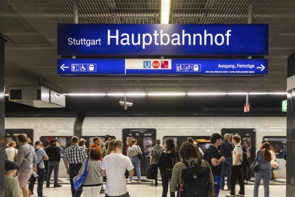 Stuttgart main station with S-Bahn. People on the platform waiting for their train. Stuttgart, Baden-Württemberg, Germany