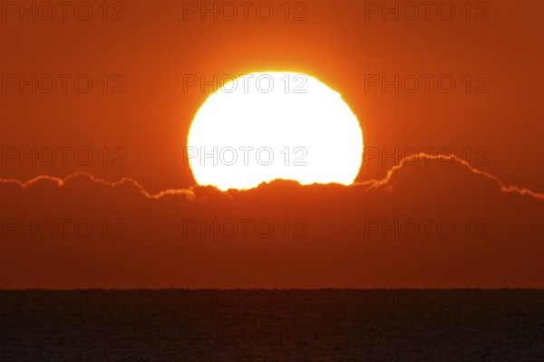 The sun rises on the Costa Rei, a stretch of coastline on the Italian Mediterranean island of Sardinia, Monte Nai, Costa Rei, Sardinia, Italy