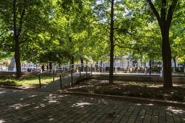 Hviezdoslav Square, promenade with trees, benches and cafés in Bratislava, Slovakia