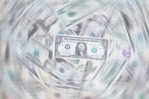 Various US dollar notes in a pile, banknotes