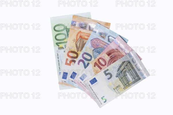 Various euro banknotes on white background, 5 euro, 10 euro, 20 euro, 50 euro, 100 euro