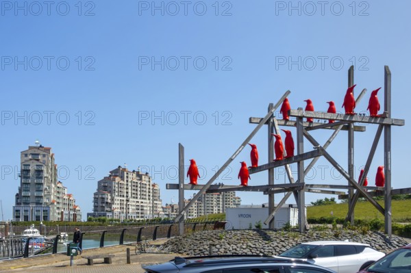 Rode Pinguins, Red Penguins, artwork by Belgian artist William Sweetlove in the harbour of Breskens along the Western Scheldt, Zeeland, Netherlands