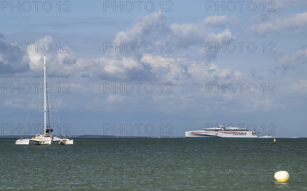 Boats on sea over Knoll Beach Studland, Poole, Dorset, England, United Kingdom