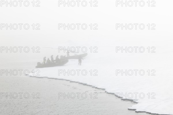 Zodiac with guides lands, Ice Edge, Sea, Spitsbergen, Svalbard