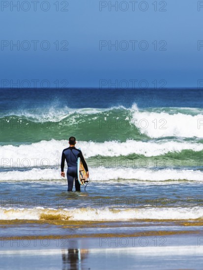 Surfer on Contis beach, Saint Julien en Born, Saint-Julien-en-Born, Landes, France