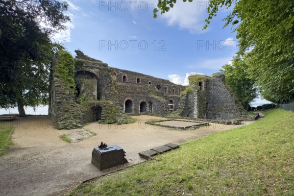 Ruins of the imperial palace of Emperor Frederick I Barbarossa, built in the Middle Ages around 1184 on today's banks of the Rhine, in the foreground small model of the original fortress building, Kaiserswerth, Düsseldorf, North Rhine-Westphalia, Germany