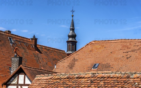 The old town centre with half-timbered houses, church towers and remains of the town wall in Büdingen, Hesse, Germany