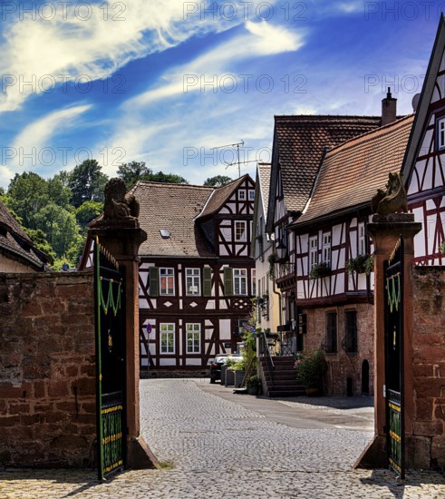 The old castle with Barbarossaplatz and the castle café in the old town centre of Büdingen, Hesse, Germany