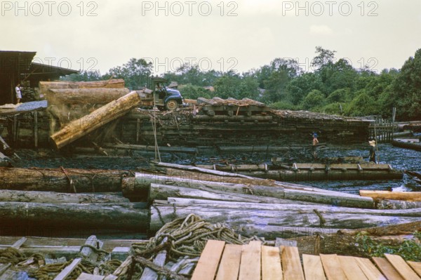 Timber lorry at East Johore Sawmills, Johor Bahru, Malaysia, Southeast Asia c 1963