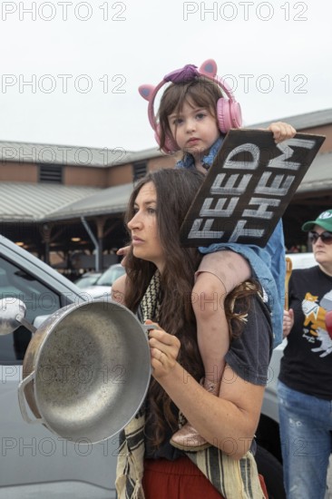 Detroit, Michigan USA - 26 July 2025 - Protesters rally at Eastern Market, banging empty pots to protest starvation in Gaza