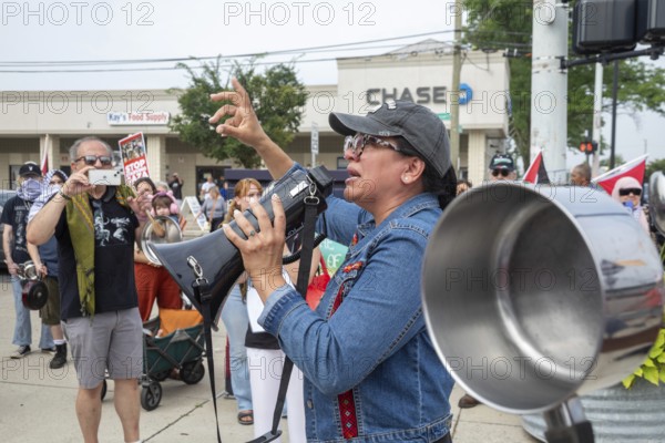 Detroit, Michigan USA - 26 July 2025 - Protesters rally at Eastern Market, banging empty pots to protest starvation in Gaza. Rashida Tlaib. the only Palestinian-American member of Congress, was near tears as she spoke about the hunger in Gaza. Tlaib has family in the West Bank