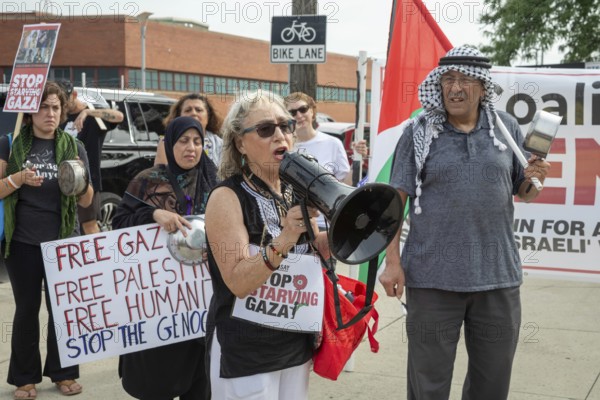 Detroit, Michigan USA - 26 July 2025 - Protesters rally at Eastern Market, banging empty pots to protest starvation in Gaza. Barbara Barefield, who is Jewish, said opposition to Israel's actions in Gaza cannot be protrayed as anti-semitism