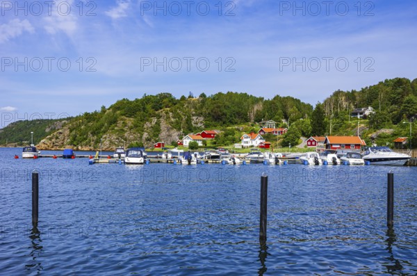 Coastal landscape with housing estate and marina in Henan, Orust, Bohuslän, Västra Götalands län, Sweden