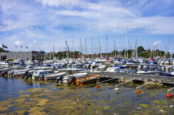Maritime ambience with marina full of boats in Henan on Orust, Bohuslän, Västra Götalands län, Sweden, for editorial use only