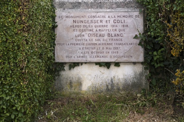 Memorial plaque, monument in honour of the French aviators François Coli and Charles Nungesser, behind the church Chapelle Notre Dame de la Garde, Étretat, Normandy, Seine-Maritime, France
