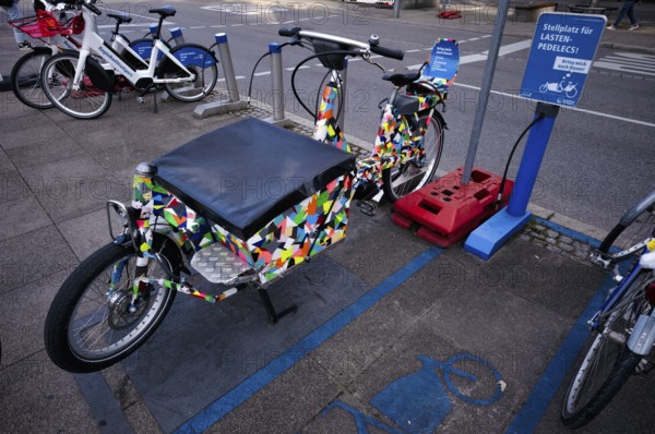 Parking space for pedelecs, cargo pedelecs, cargo bikes, e-bikes, electric bikes, hire bikes, rental bikes, of the RegioRad bike and pedelec hire system, Stuttgart, Baden-Württemberg, Germany