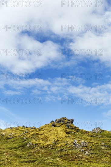 Volcanic rock, overgrown with moss, sparse vegetation, volcanic landscape, cumulus, text free space, Snæfellsnes Peninsula, Snaefellsnes, West Iceland, Iceland
