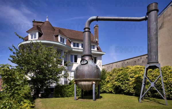 Distillation plant, distillery, boiler, behind it art gallery Domaine Création, Fécamp, Normandy, Seine-Maritime, France