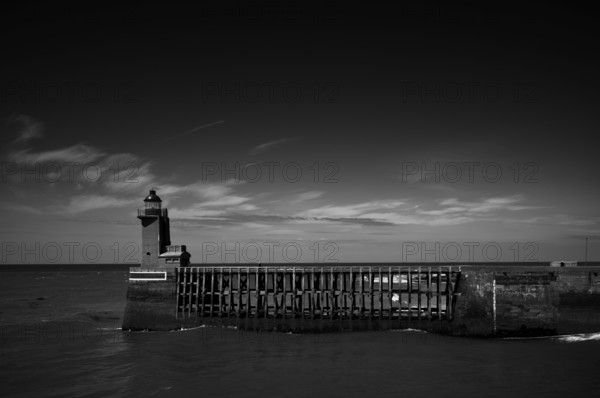 Sea, lighthouse Feu de la jetée Sud, lighthouse, black and white, harbour entrance, pier, Fécamp, Normandy, Seine-Maritime, France