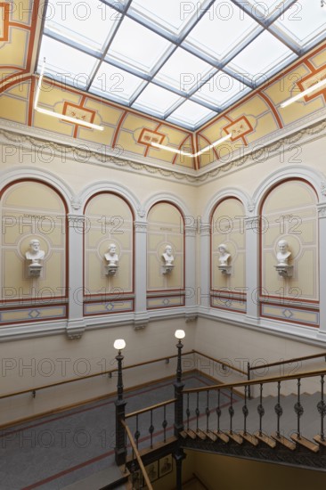Staircase with busts of ancient Greek and Roman scholars, main building of the University of Rostock, Mecklenburg-Western Pomerania, Germany