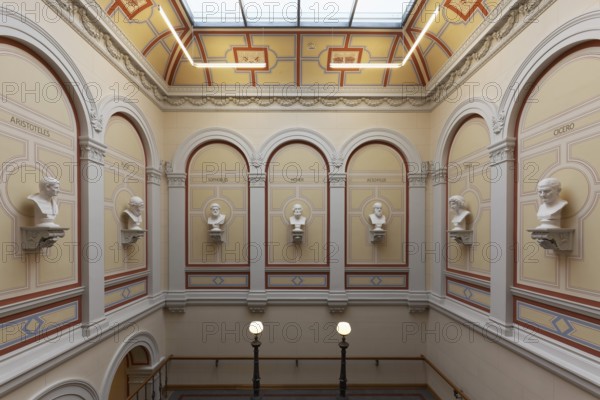 Staircase with busts of ancient Greek and Roman scholars, main building of the University of Rostock, Mecklenburg-Western Pomerania, Germany
