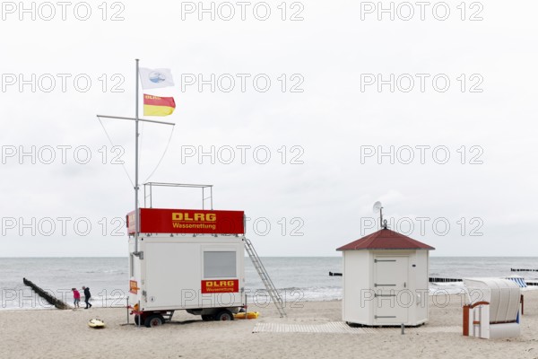 DLGR water rescue station on the beach at the Baltic Sea, grey sky, Kühlungsborn, Mecklenburg-Vorpommern, Germany