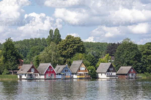 Boathouses, holiday homes on Lake Mirow, Mirow, Mecklenburg Lake District, Mecklenburg-Western Pomerania, Germany