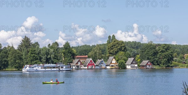 Boathouses, holiday homes on Lake Mirow, excursion boat, canoe, Mirow, Mecklenburg Lake District, Mecklenburg-Western Pomerania, Germany