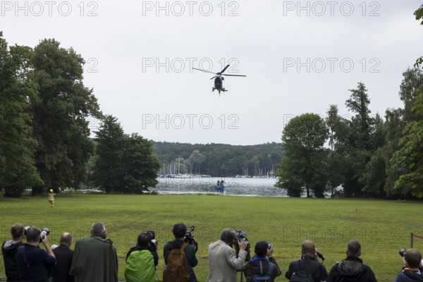 A helicopter lands in front of a joint meeting between Friedrich Merz (CDU, German Chancellor) and Emmanuel Macron (President of the French Republic) at the Villa Borsig in Berlin on 23 July 2025