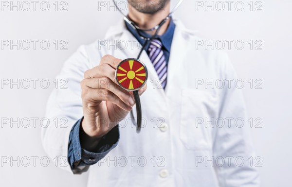 North Macedonia healthcare system, doctor holding stethoscope. North Macedonia health and medical insurance concept