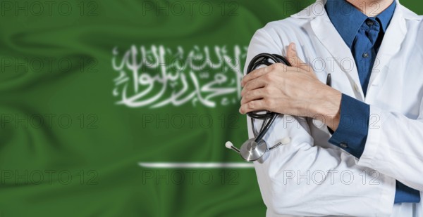 Doctor with stethoscope on Saudi Arabia flag. Doctor holding stethoscope on Saudi Arabia flag