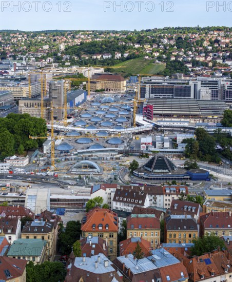Stuttgart Central Station. The Stuttgart 21 construction site, where the new through station is being built. The 27 skylights that naturally illuminate the future through station are a characteristic feature. On the right are the current platforms of the current terminus station, at the front left the south surge structure for the ventilation of the underground platform hall. Stuttgart, Baden-Württemberg, Germany