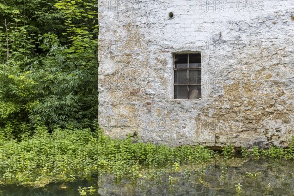 Old barn. The building is located near the source of the Zwiefalter Ach river at the Wimsen Cave excursion destination in the Swabian Alb. Hayingen, Baden-Württemberg, Germany