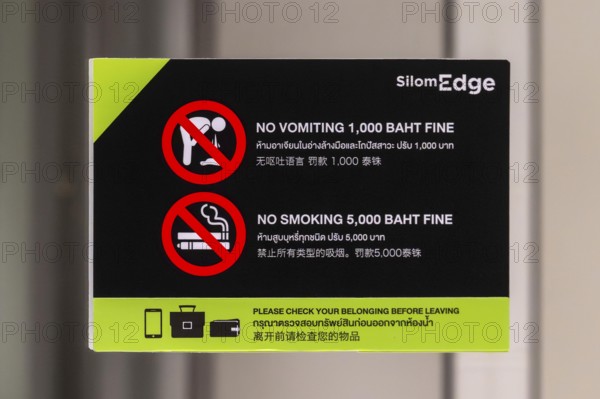 Sign fine for vomiting and smoking, Bangkok, Thailand