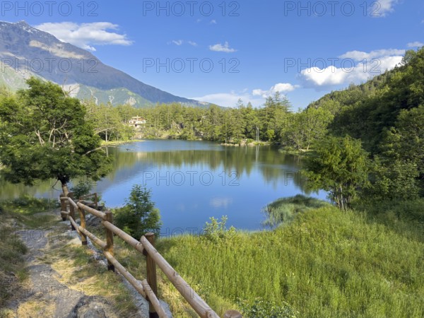 View of small picturesque romantic mountain lake Lago Grande near Moncenisio in Val Cenischia in Graian Alps, Moncenisio, Piedmont, Italy