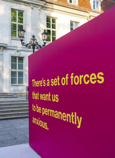 Tony Cokes, visual artist and educator, display panel at the Palais Populaire Unter den Linden, Berlin, Germany